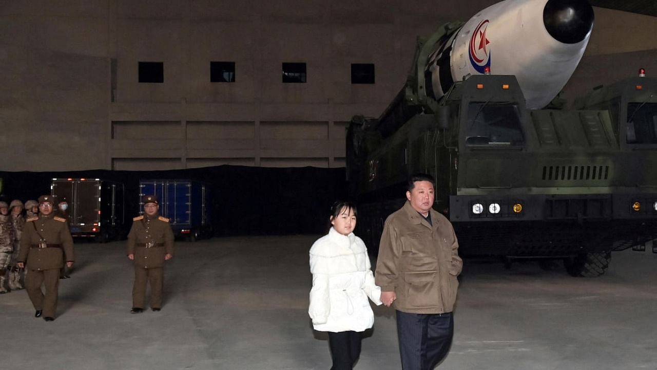 North Korean leader Kim Jong Un, along with his daughter, inspects an ICBM. Photo Credit: Reuters/ KCNA
