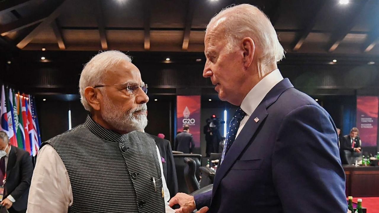 Prime Minister Narendra Modi interacts with US President Joe Biden during the G20 Summit in Bali. Photo Credit: AFP Photo