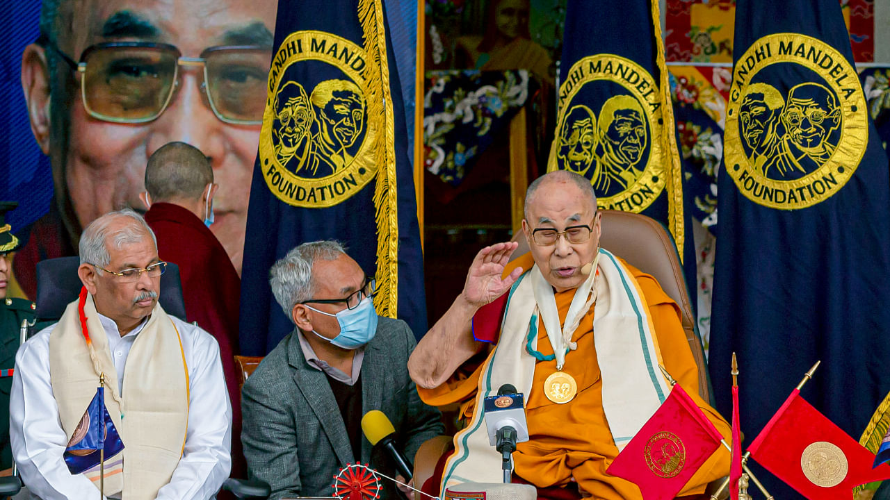 The Dalai Lama speaks during the Gandhi Mandela Awards ceremony, organised by Gandhi Mandela Foundation, as Himachal Pradesh Governor Rajendra Vishwanath Arlekar looks on, at Tsugla Khang temple, Mcleodganj, in Dharamshala. Credit: PTI Photo