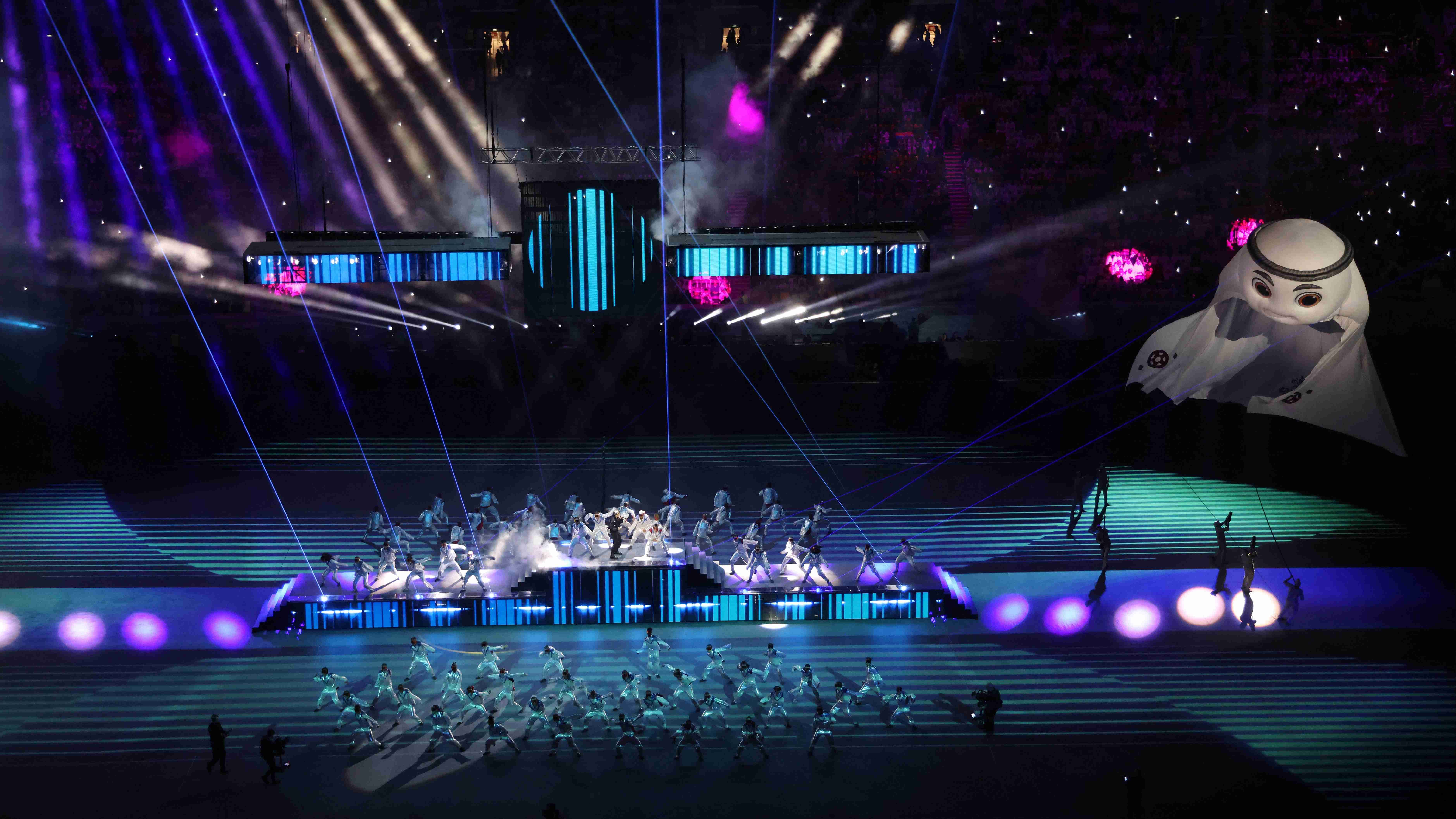 General view of singer Jung Kook performing during the opening ceremony. Credit: Reuters Photo