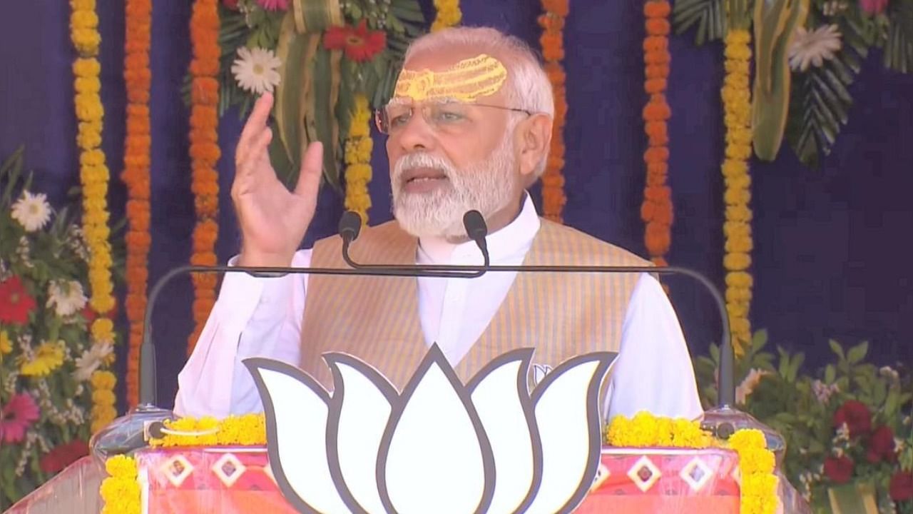 PM Narendra Modi at a public meeting ahead of the Gujarat Assembly elections, at Veraval in Gir Somnath. Photo Credit: PTI Photo