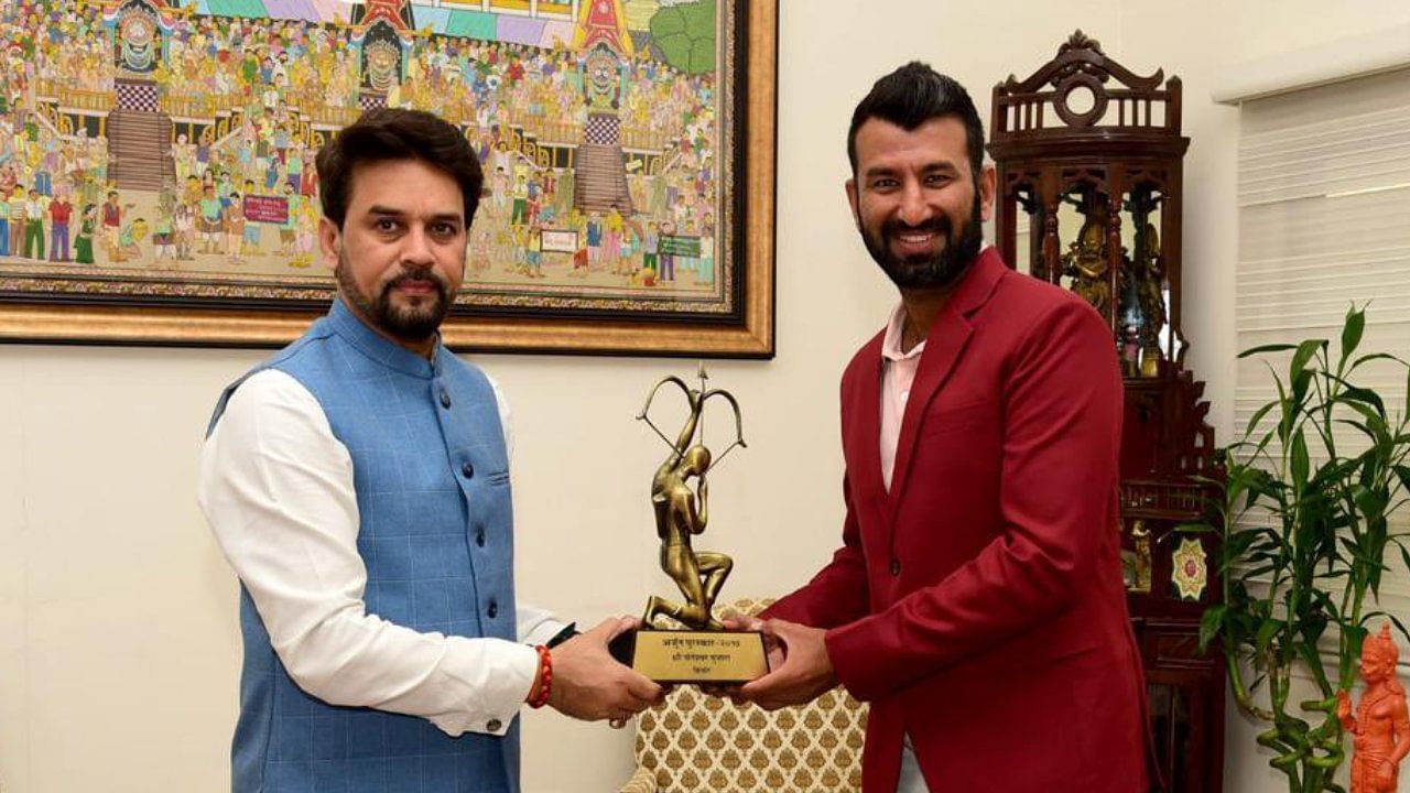 Cricketer Cheteshwar Pujara with Sports Minister Anurag Thakur. Photo Credit: Twitter / @cheteshwar1