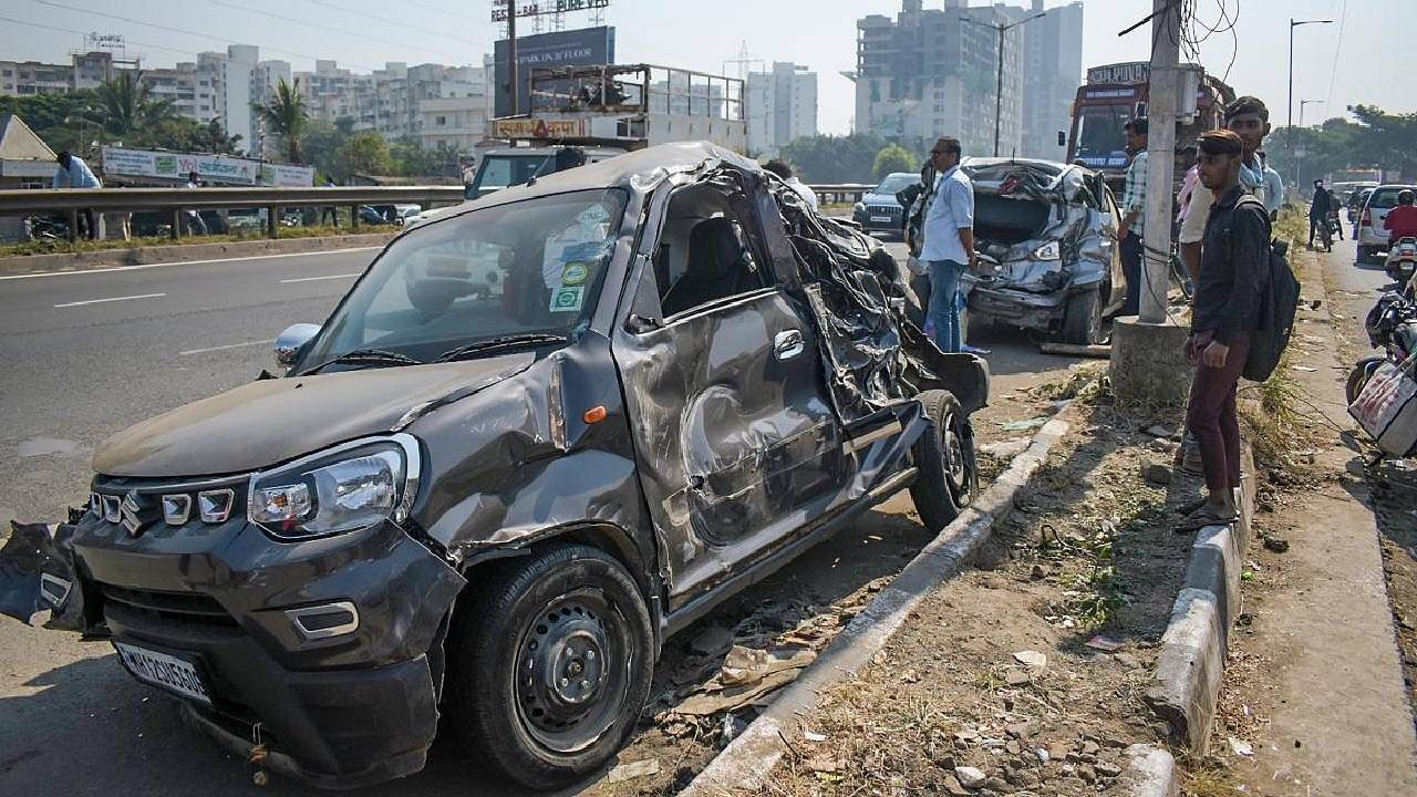 Damaged vehicles after a truck lost control and rammed into vehicles stuck in traffic on Navale bridge in Pune. Credit: PTI Photo