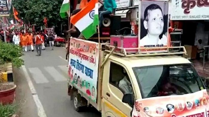 Hindu Mahasbha rally with Nathuram Godse picture. Credit: IANS Photo