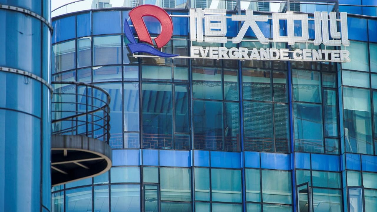 The logo of China Evergrande Group seen on the Evergrande Center in Shanghai. Photo Credit: Reuters Photo