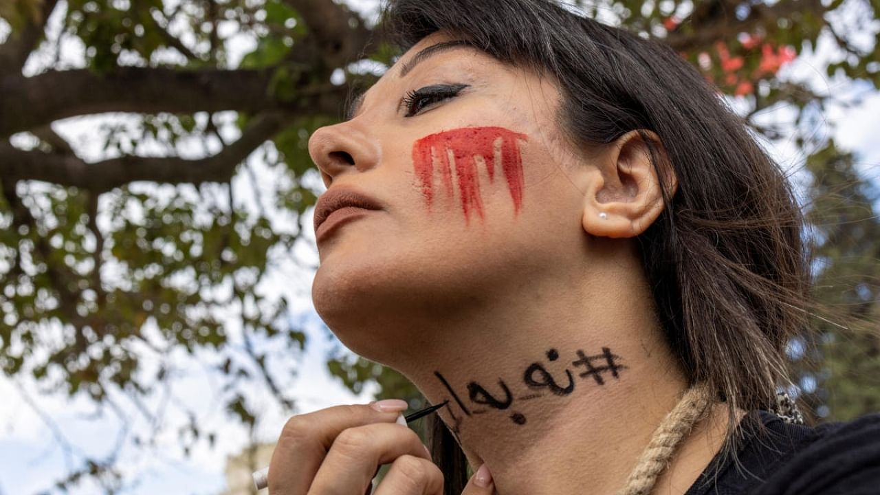 Member of the Iranian community protesting against the nation's government. Credit: Reuters Photo