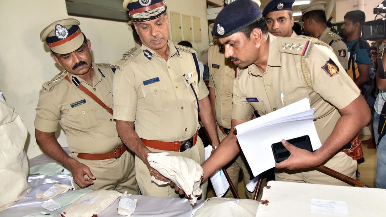 ADGP Alok Kumar inspecting items seized from Shariq's house, in Mangaluru on Monday. Credit: Special Arrangement