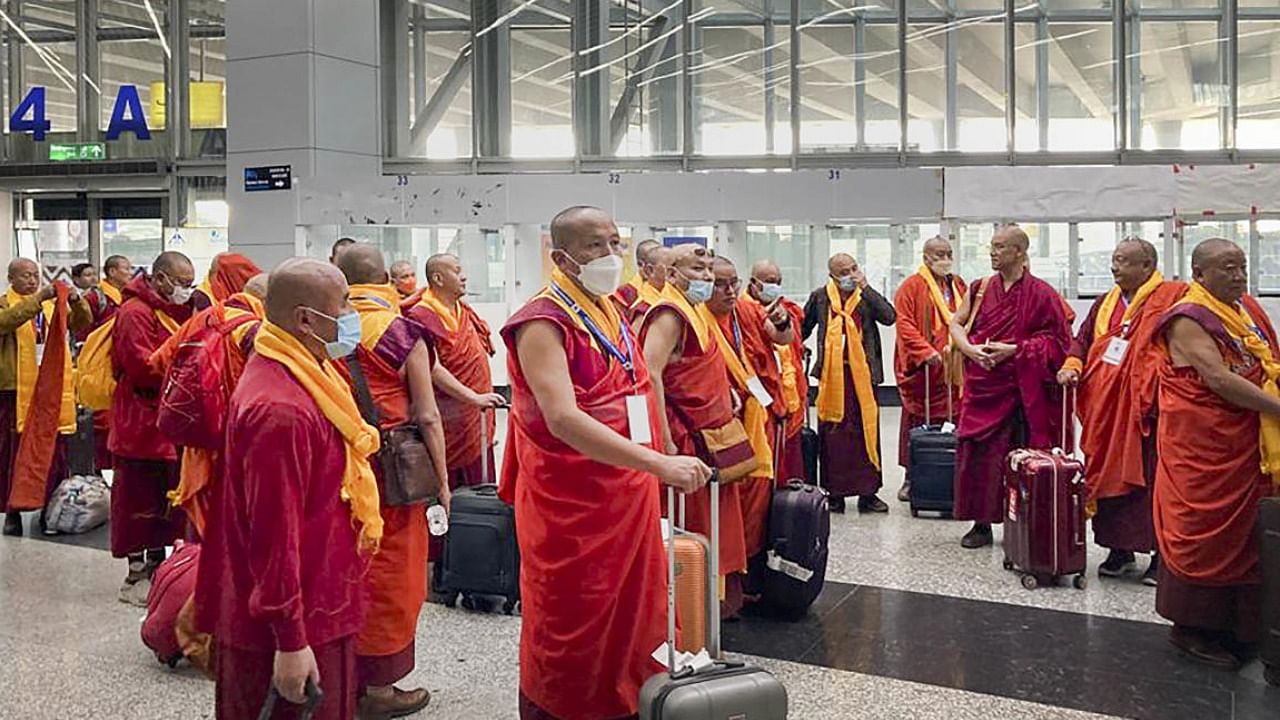 A delegation of leading Buddhist monks from Bhutan upon arrival in Kolkata. Photo Credit: PTI
