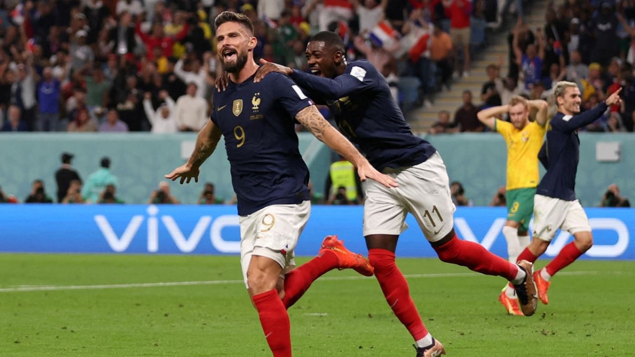 France's Olivier Giroud celebrates scoring their second goal with Ousmane Dembele. Credit: Reuters Photo