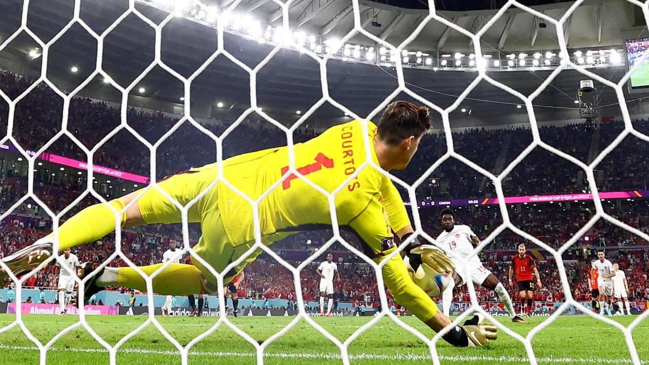 Canada's Alphonso Davies has his penalty saved by Belgium's Thibaut Courtois. Credit: Reuters Photo