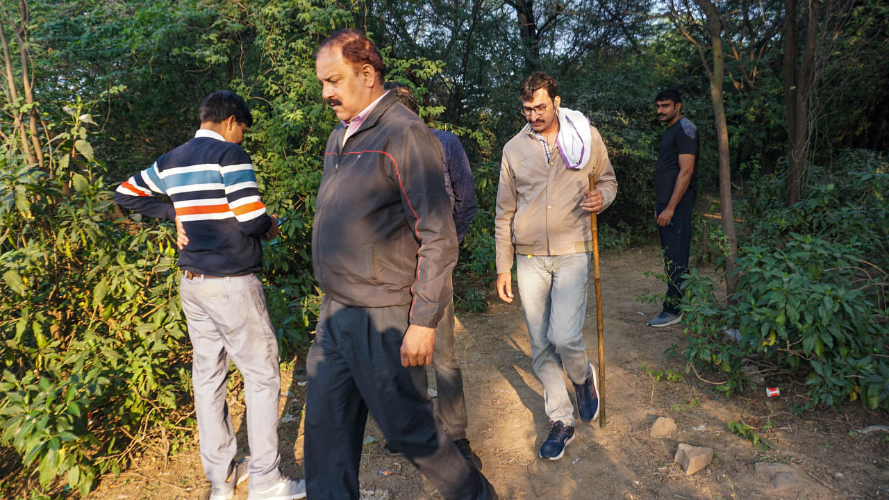 Police conduct search operation at Mehrauli forest area during investigation of Aftab Ameen Poonawala, accused of killing his partner Shraddha Walkar, in New Delhi, Sunday, Nov 20. Credit: PTI Photo