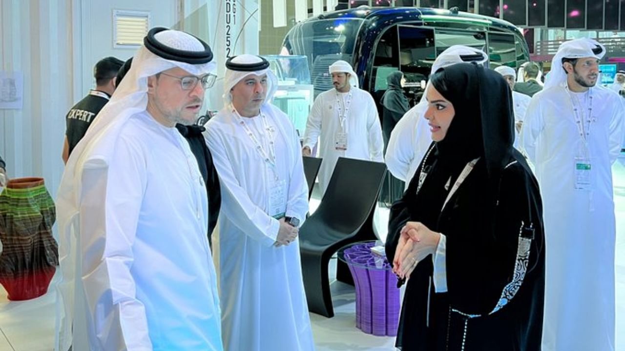 Mohamed Ali Al Shorafa, chairman of the Abu Dhabi Department of Economic Development (left). Credit: Twitter/adchamber