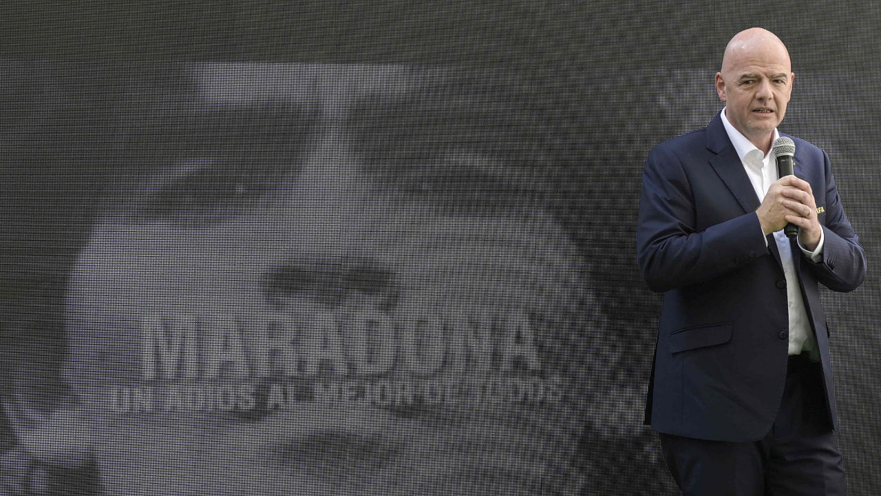 FIFA President Gianni Infantino (L) talks during a tribute ceremony to late football star Diego Maradona on the 2nd anniversary of his death at the Conmebol fan zone. Credit: AFP Photo