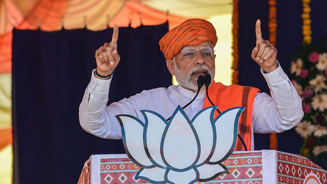 Modi addressed a rally at the Bavla village on Thursday as part of the BJP's campaign for the Gujarat Assembly polls. Credit: PTI Photo