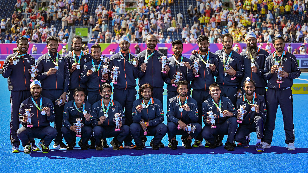 Silver medalist Indian team poses for photographs during the presentation ceremony of the men's hockey, at the Commonwealth Games 2022 (CWG), in Birmingham. Credit: PTI Photo