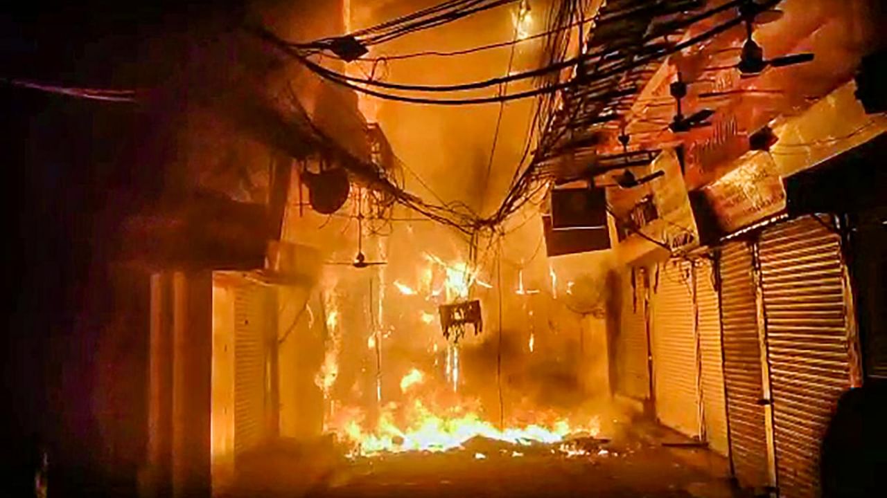 Fire at Bhagirath Palace Market. Credit: PTI Photo