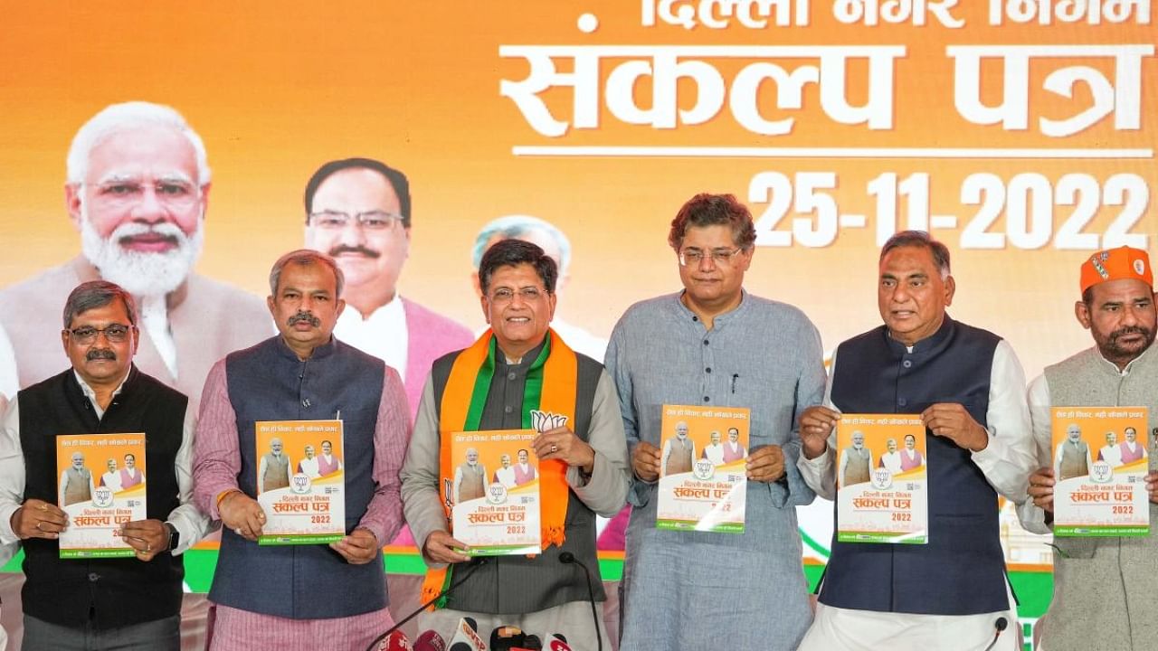 Union Minister Piyush Goyal, Delhi BJP President Adesh Gupta, party leader Baijayant Jay Panda, LOP Ramvir Singh Bidhuri and others during release of BJP party manifesto, at party HQ in New Delhi. Credit: PTI Photo