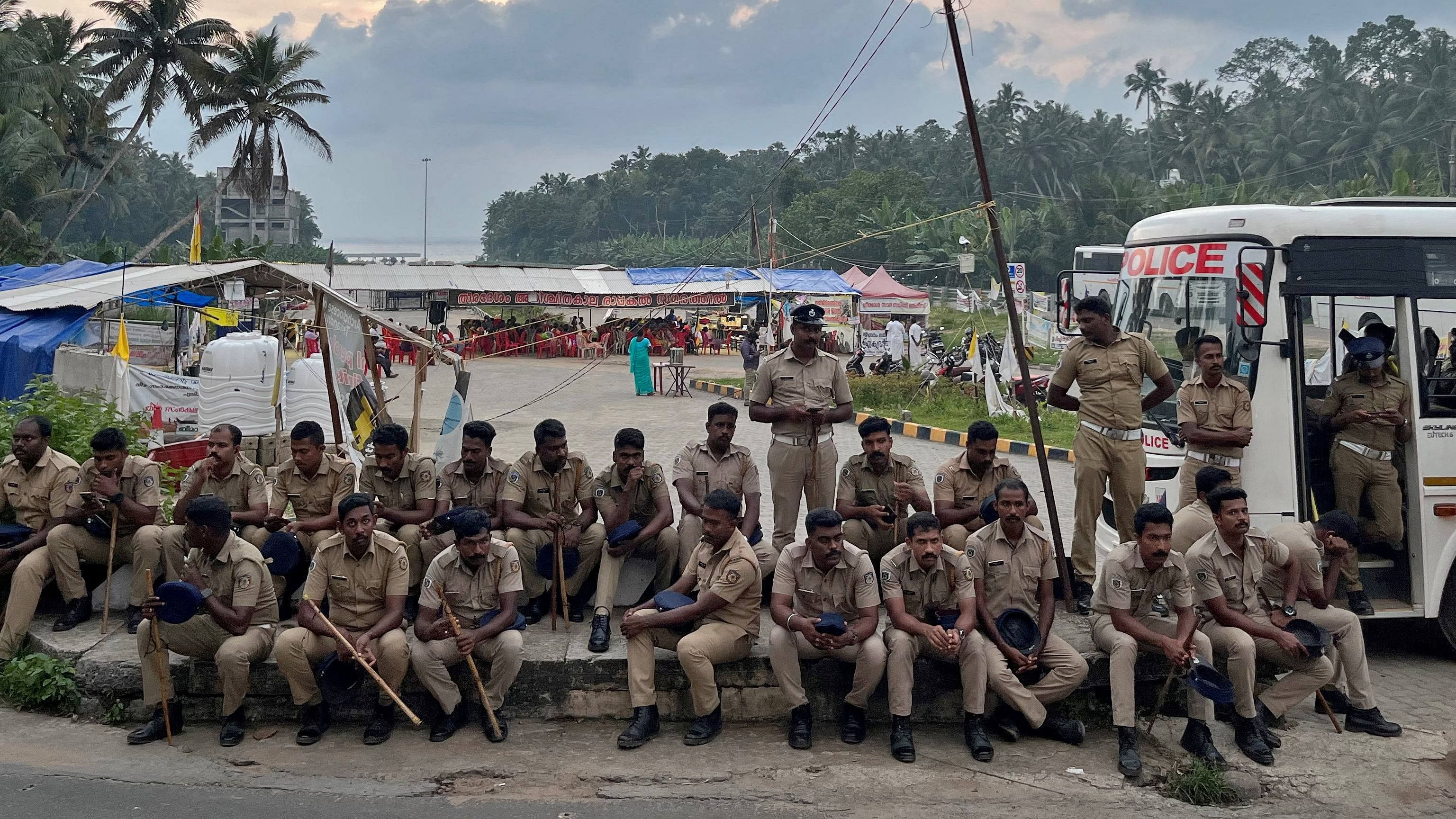 Police officers are deployed as fishermen protest near the entrance of the proposed Vizhinjam Port in the southern state of Kerala, India, November 9, 2022. Credit: Reuters Photo