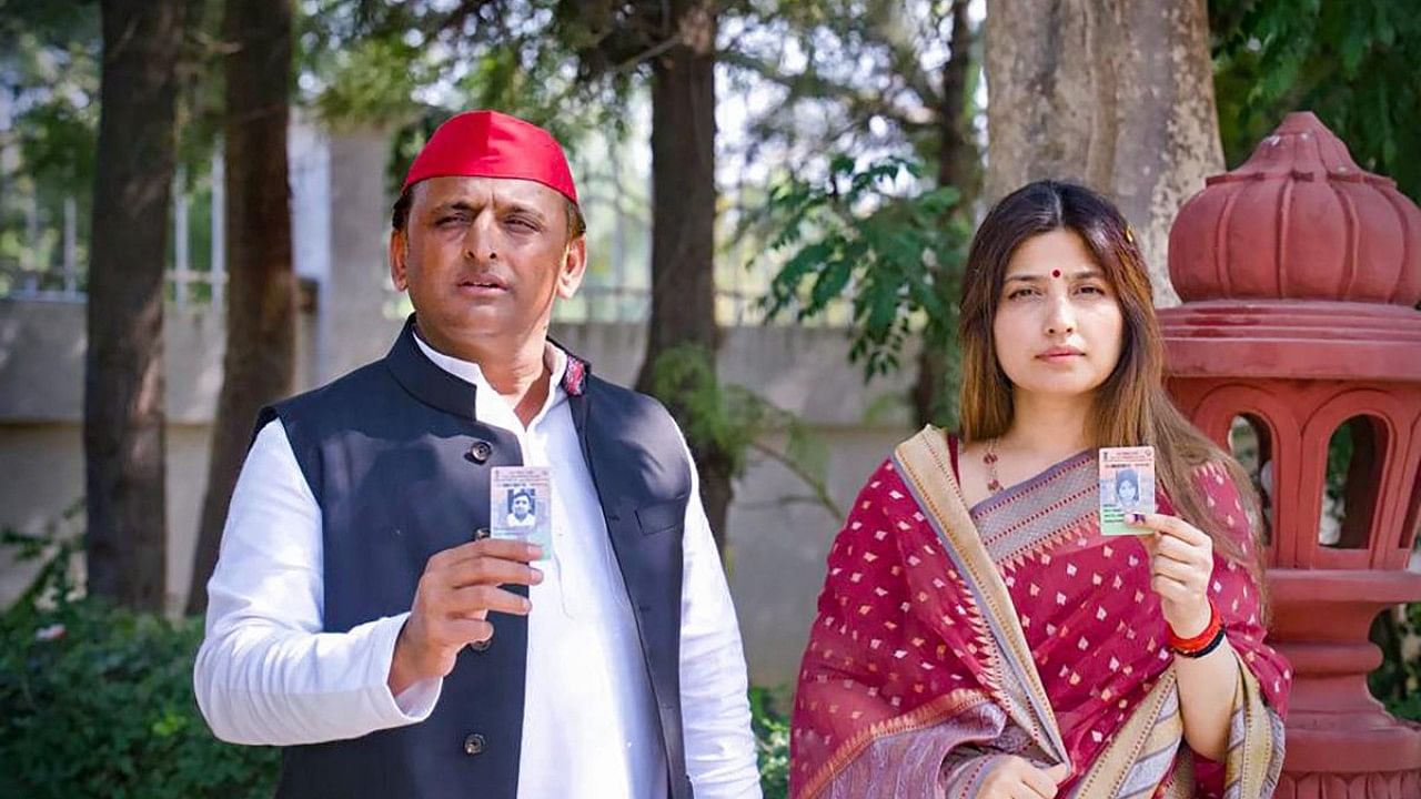 Samajwadi Party President Akhilesh Yadav with his wife and former MP Dimple Yadav. Credit: PTI File Photo