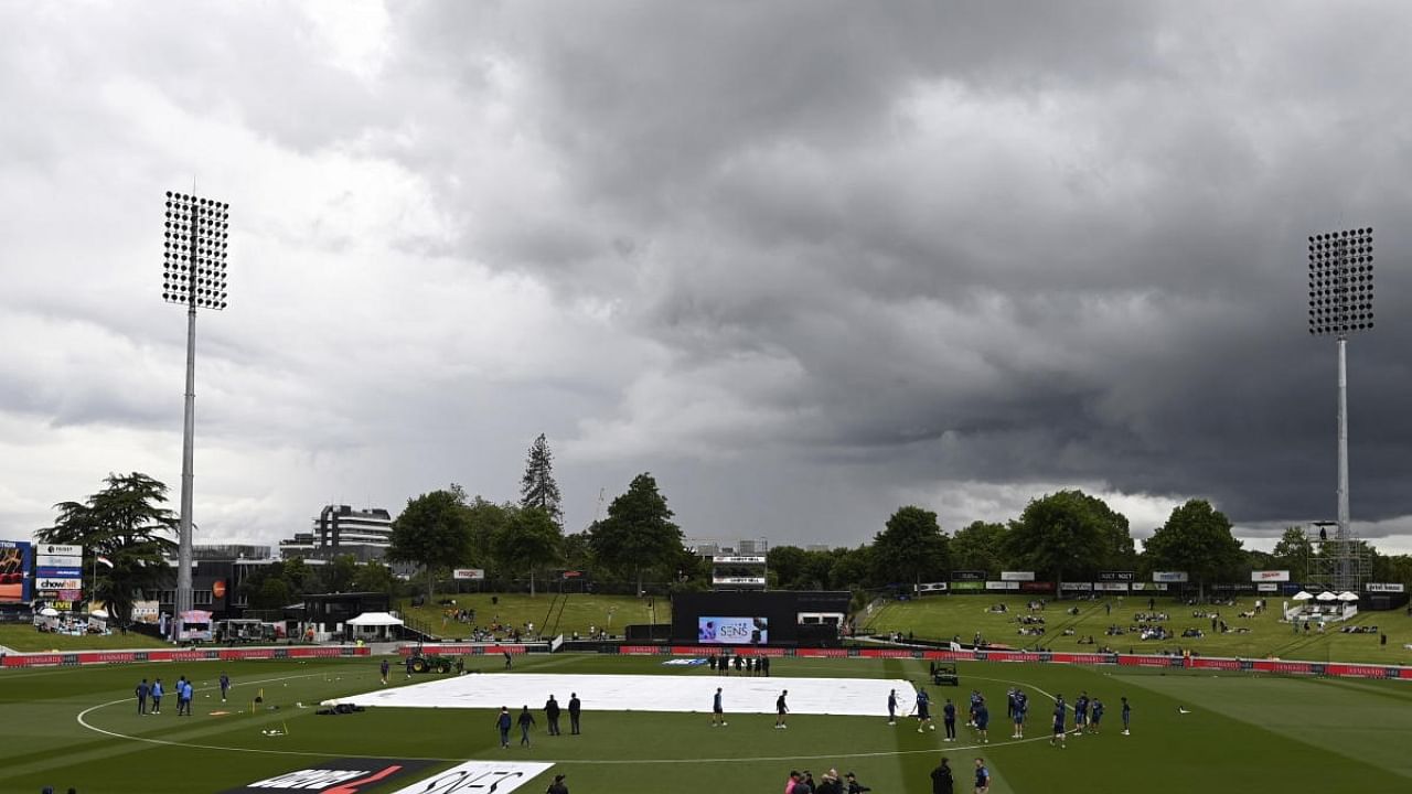 Dark clouds hover in the sky before the one day international cricket match between India and New Zealand at Seddon Park in Hamilton. Credit: AP/PTI Photo