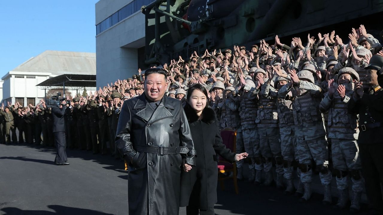 Kim Jong Un and his daughter. Credit: AFP Photo/KCNA via KNS