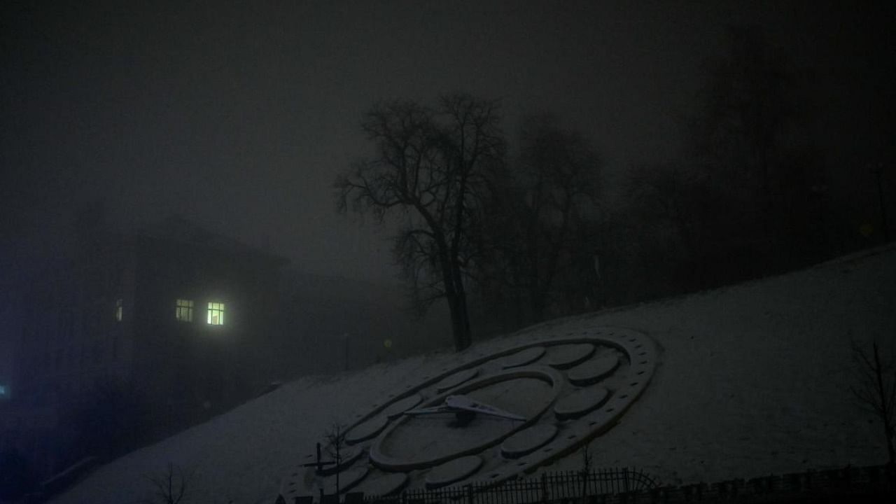 The Flower Clock in Kyiv is seen covered in snow amid shortage of power supply in the city. Credit: AFP Photo