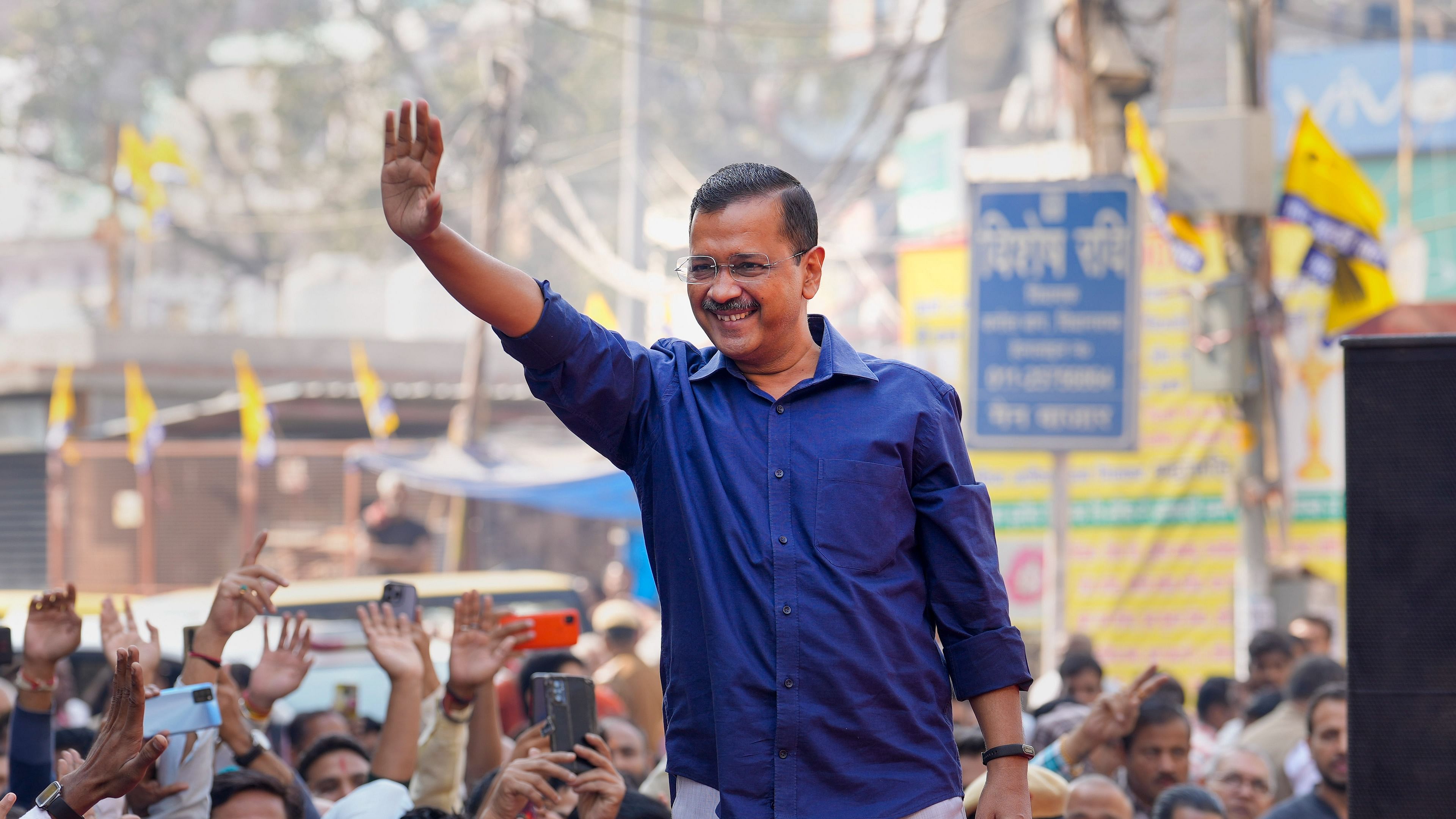 "I am going to make a prediction in writing in front of you all...Note down the prediction that the AAP is going to form government in Gujarat," Kejriwal said. Credit: PTI Photo