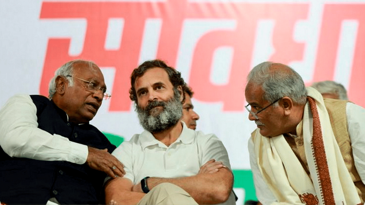 Congress President Mallikarjun Kharge with party leaders Rahul Gandhi and Bhupesh Baghel during a public meeting in Mhow. Credit: PTI Photo