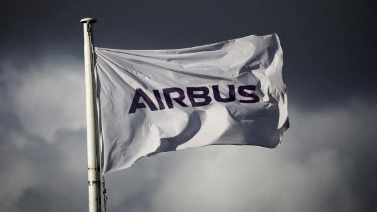 The logo of Airbus is pictured on a flag at the entrance of the Airbus facility. Credit: Reuters Photo