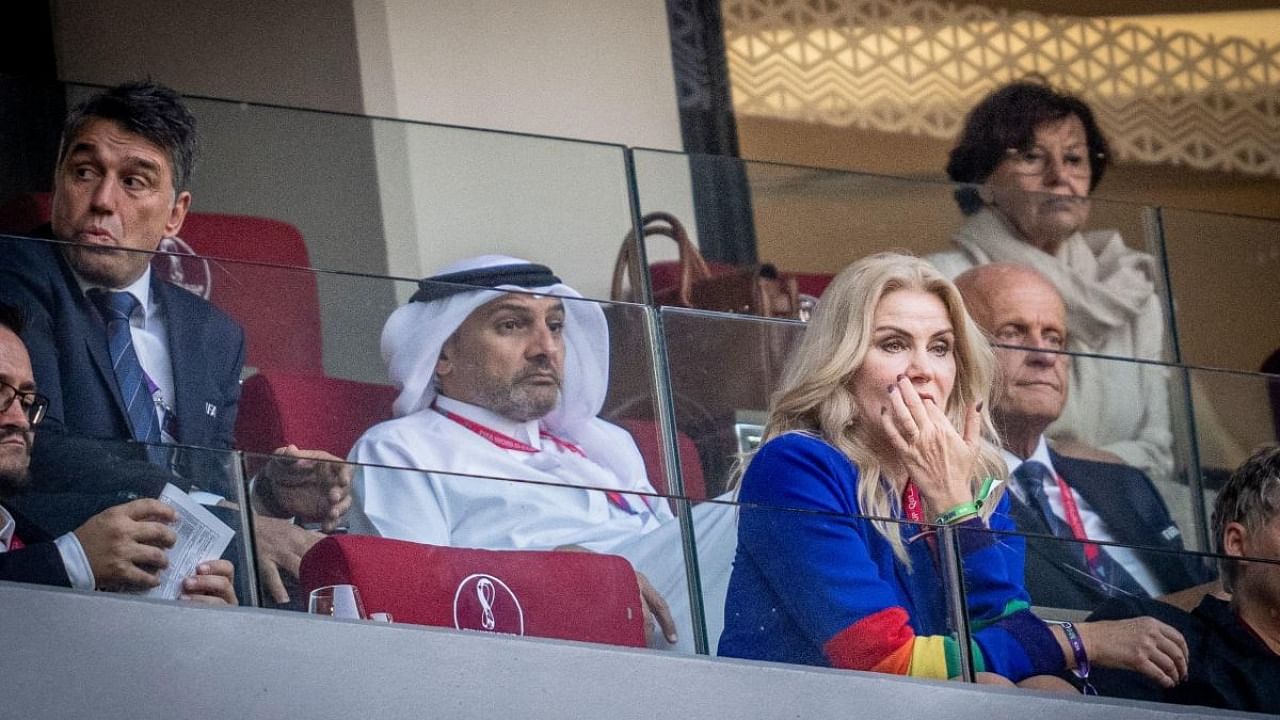 Former danish prime Minister Helle Thorning-Schmidt wears a rainbow coloured sleeves on her outfit during the Qatar 2022 World Cup Group D football match between Denmark and Tunisia at the Education City Stadium in Al-Rayyan, west of Doha on November 22, 2022. Credit: AFP Photo