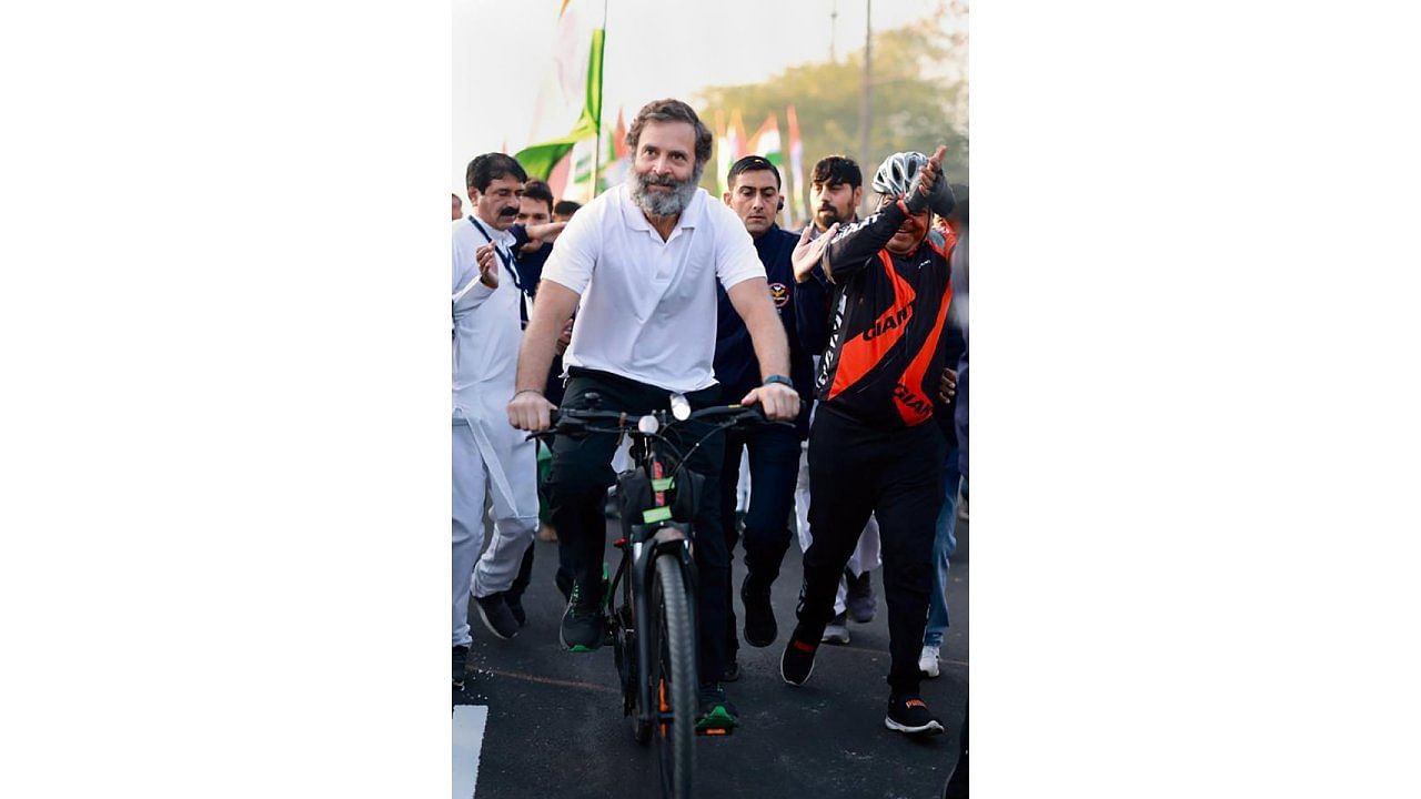 Rahul Gandhi rides a bicycle during Congress's Bharat Jodo Yatra. Credit: PTI Photo