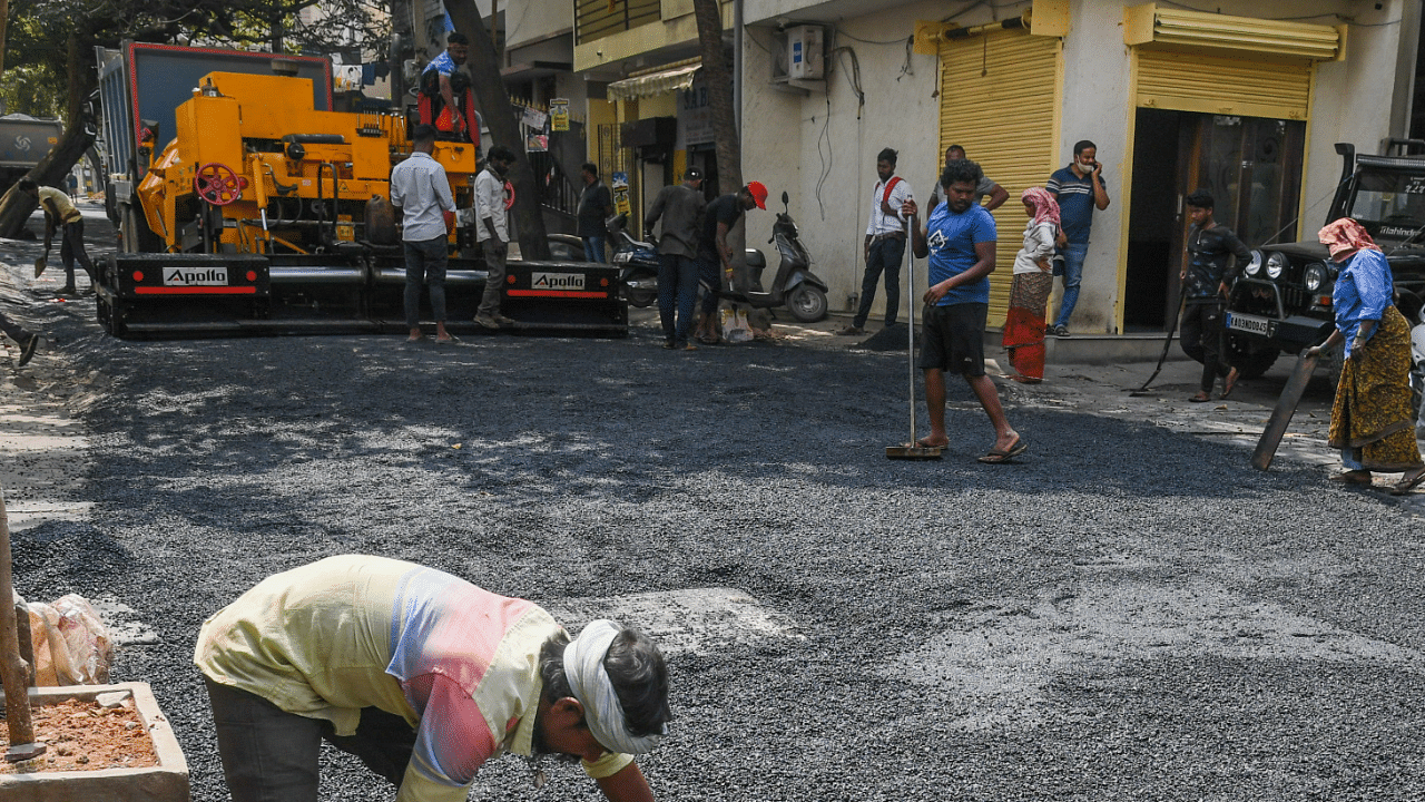 Some of the works that are part of the action plan include the repair of footpaths, filling of potholes, desilting of drains. Credit: DH Photo