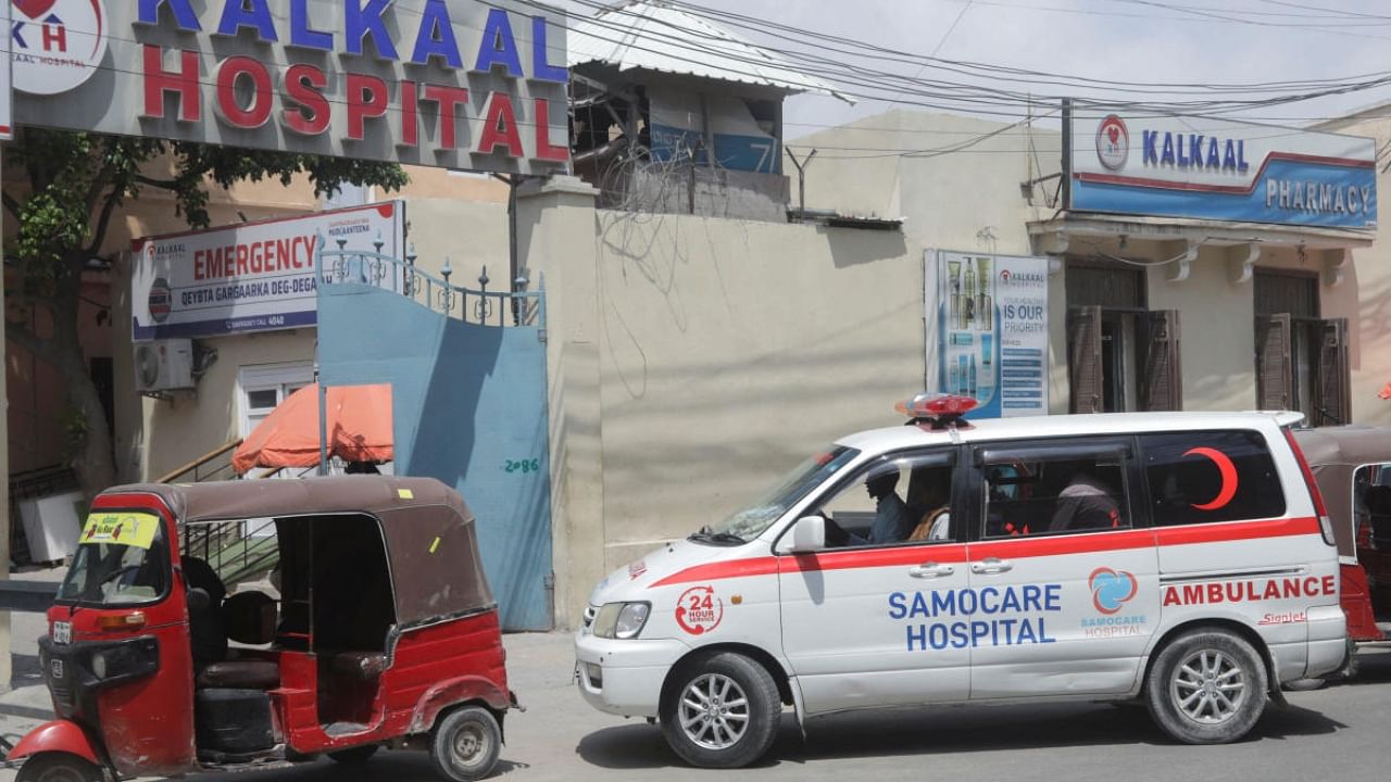 A Somacare ambulance carrying an unidentified wounded person drives into the Kalkaal hospital after al Qaeda-linked al Shabaab Islamist militants attacked Villa Rose hotel, in Mogadishu, Somalia November 28, 2022. Credit: Reuters Photo