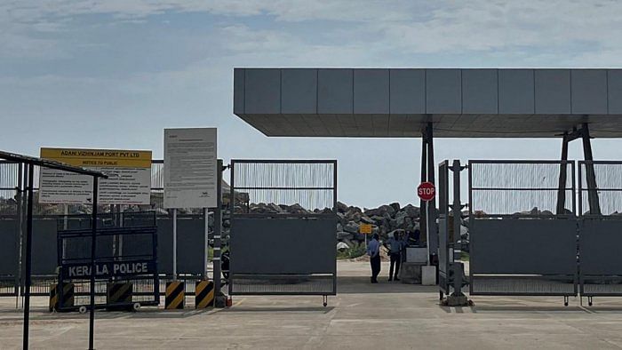 Private security guards stand near an entrance of the proposed Vizhinjam Port. Credit: Reuters Photo