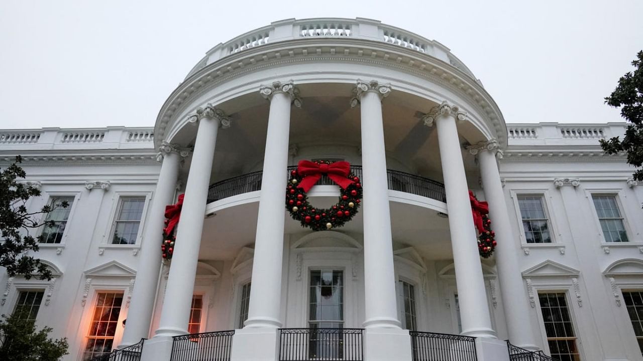 Christmas wreaths adorn the outside of the White House in Washington, DC, US, November 27, 2022. Credit: Reuters Photo