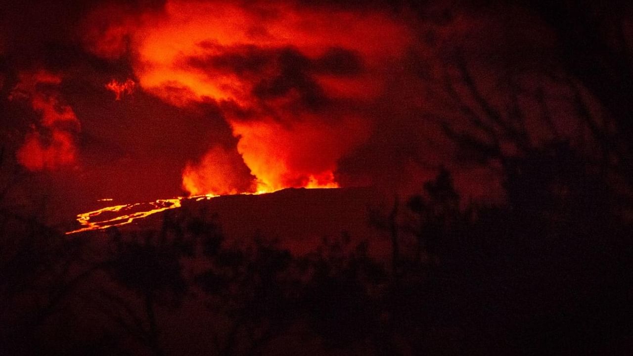 The world's largest active volcano burst into life for the first time in 40 years, spewing lava and hot ash Monday in a spectacular display of nature's fury by Mauna Loa in Hawaii. Credit: AFP Photo