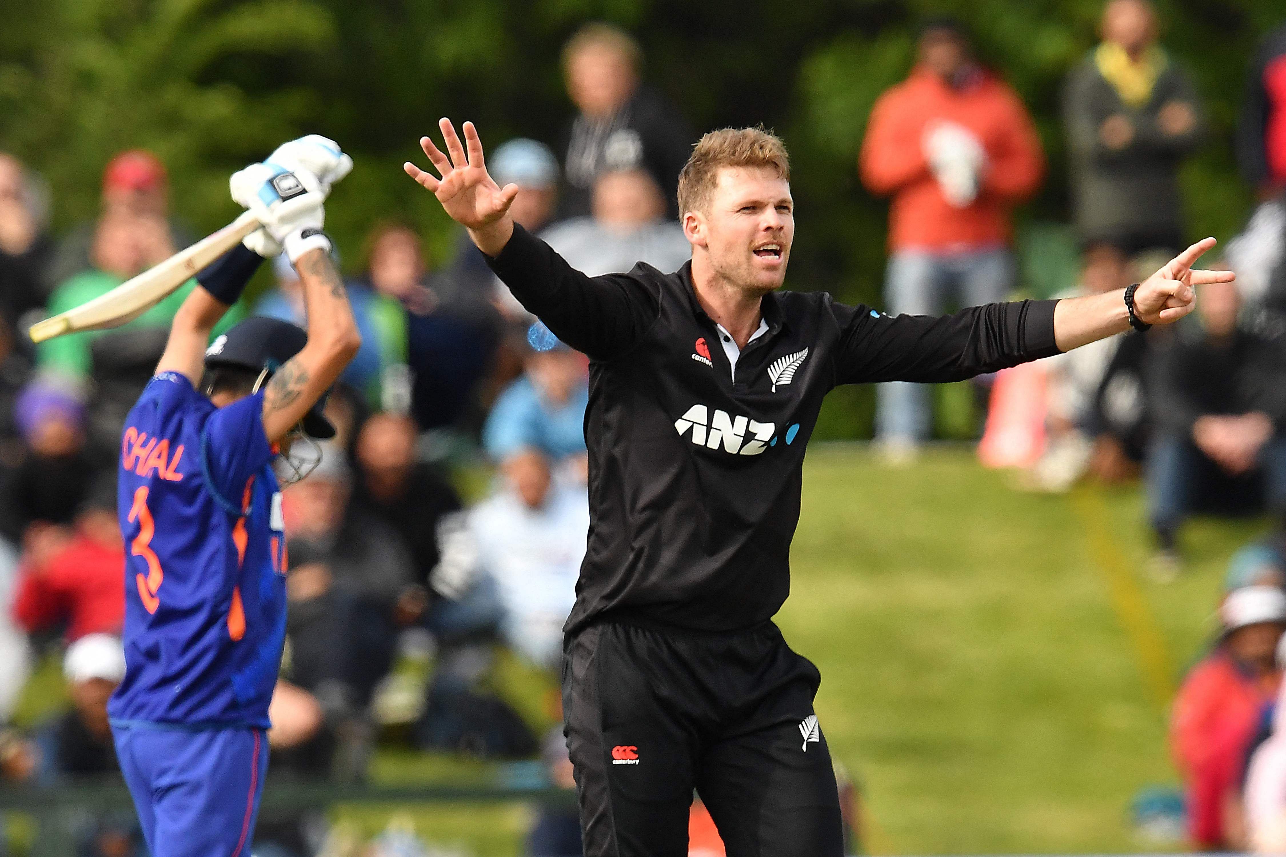 New Zealand's Lockie Ferguson (R) appeals unsuccessfully against India's Yuzvendra Chahal during the third and final one-day international cricket match between New Zealand and India. Credit: AFP Photo