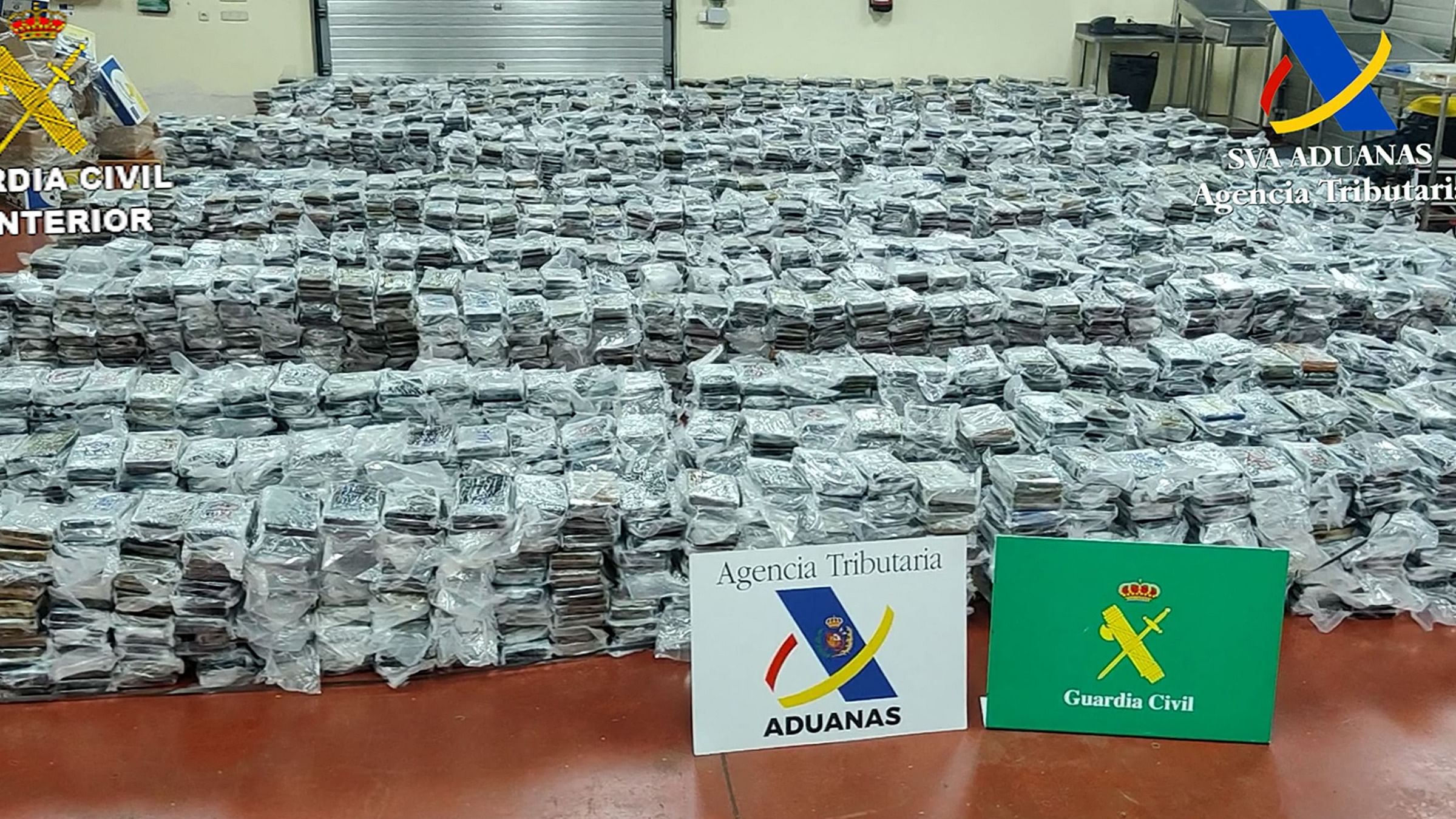 A photo shared by the ministry showed a pile of plastic-wrapped bricks of what it said was cocaine with the word "rey" ("king"), written in bold letters on them. Credit: AFP Photo / GUARDIA CIVIL