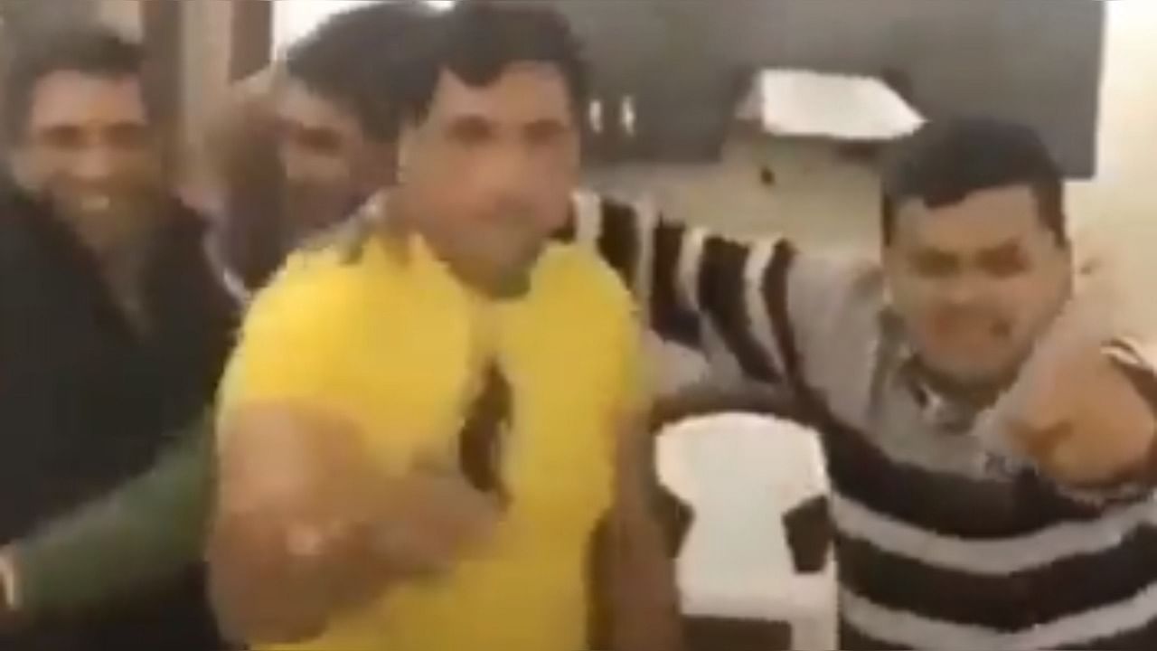 Screengrab of a video where Singh was seen dancing and waving a pistol. Credit: Twitter