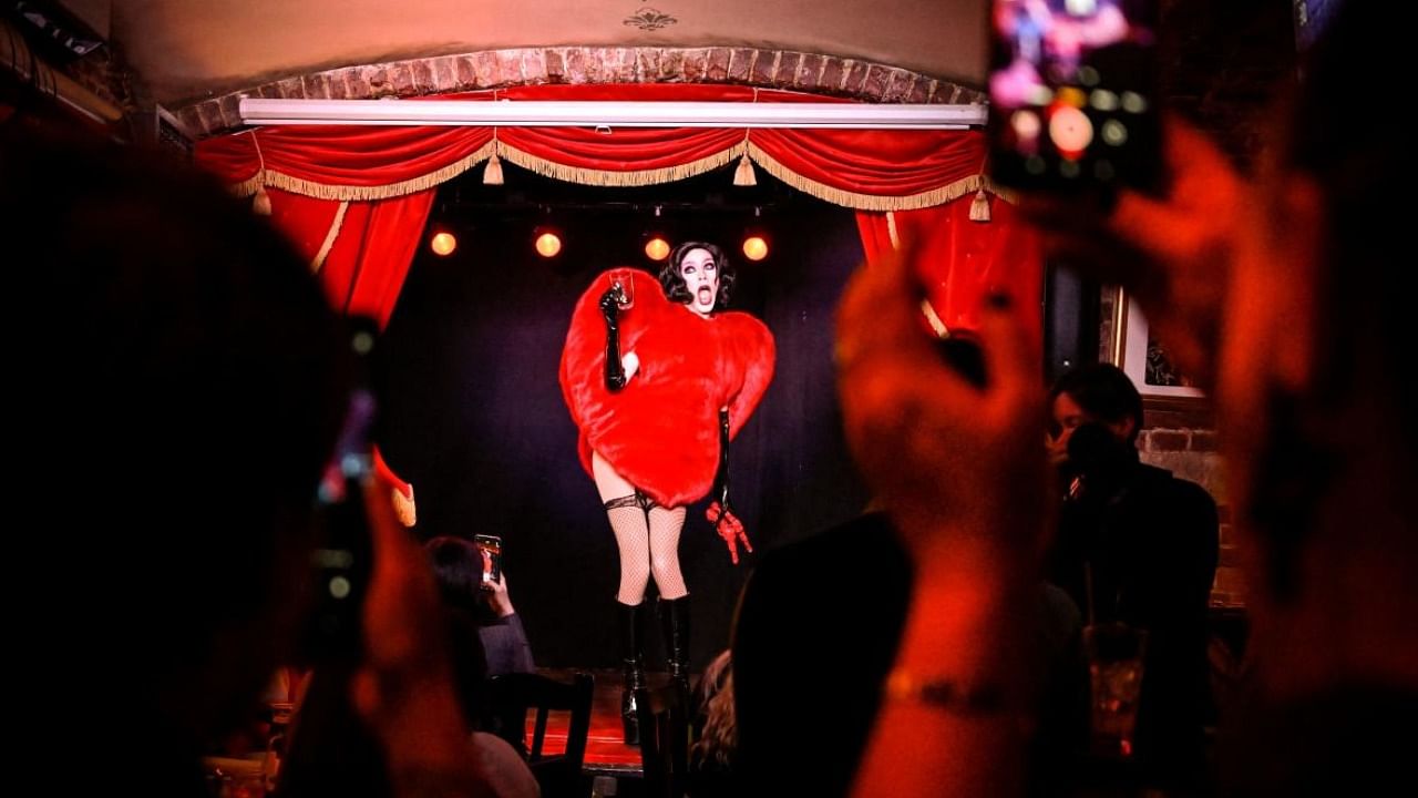 Dmitry, who goes by the stage name of Kamilla Crazy White performs during a drag queens show in a pub in Moscow. Credit: AFP Photo