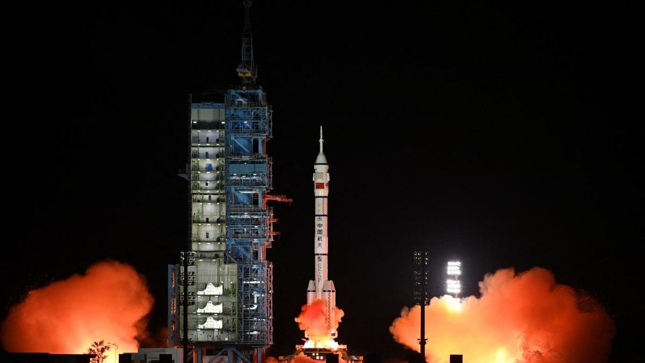 A Long March-2F carrier rocket, carrying the Shenzhou-15 spacecraft with three astronauts to China's Tiangong space station, lifts off from the Jiuquan Satellite Launch Center in Northwest China’s Gansu Province. Credit: AFP Photo