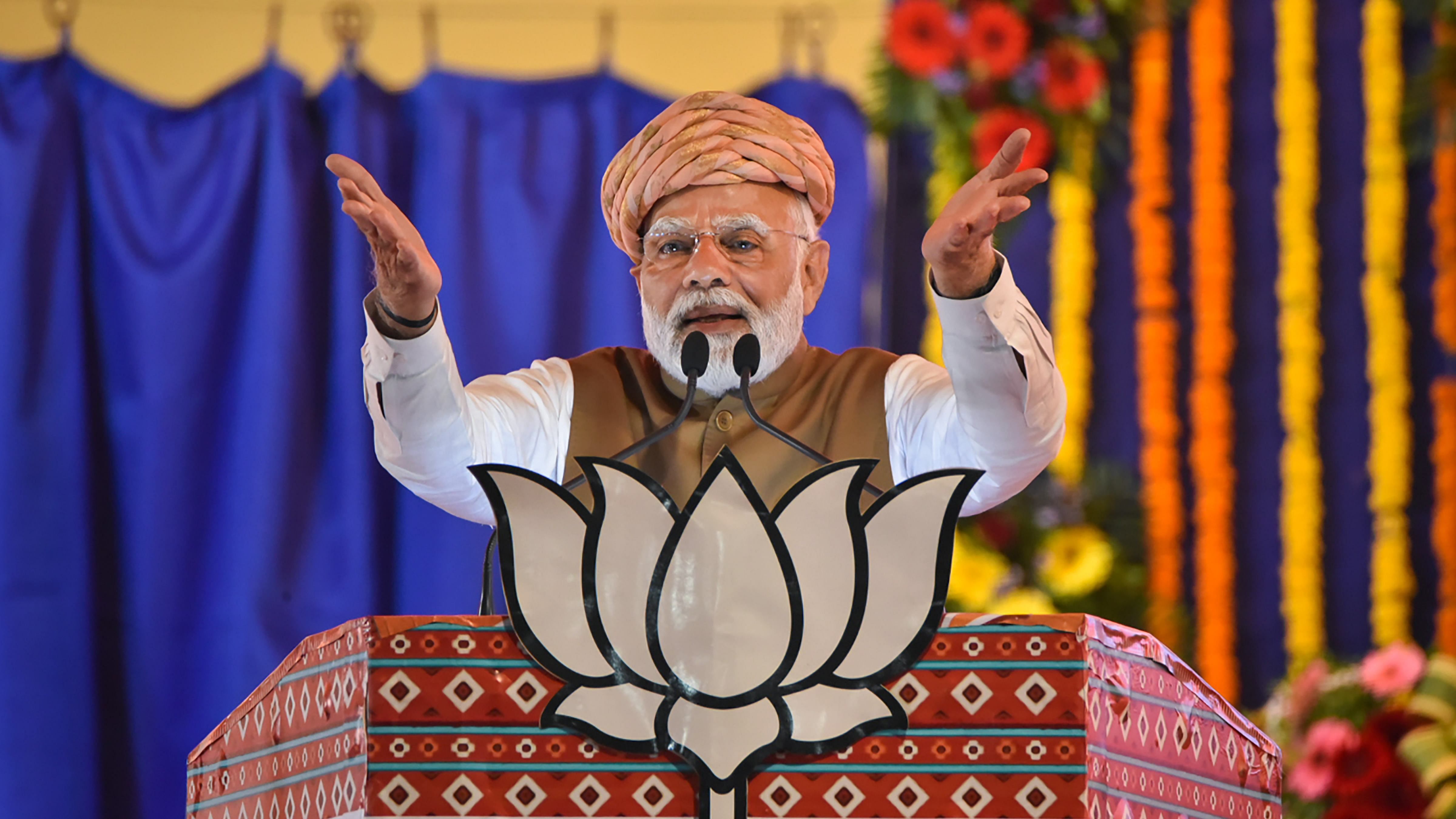 Prime Minister Narendra Modi speaks during a public meeting ahead of Gujarat Assembly elections, in Rajkot. Credit: PTI Photo