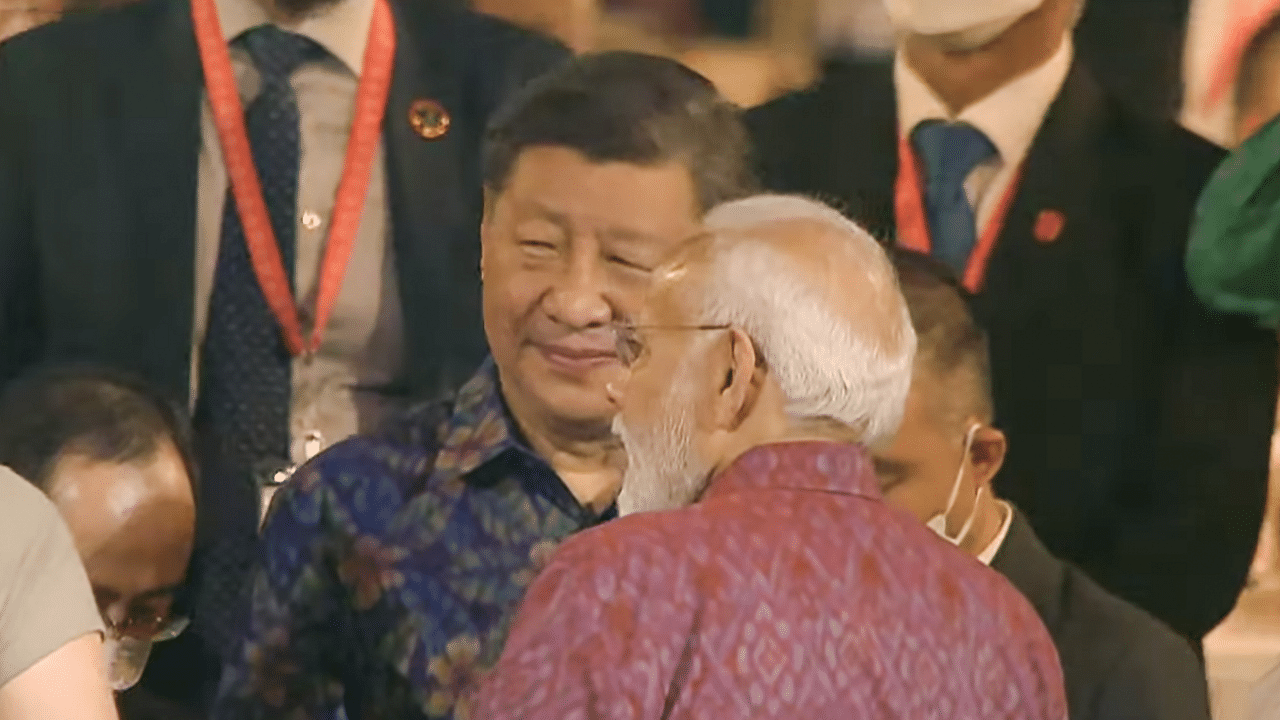 Prime Minister Narendra Modi with Chinese President Xi Jinping at G20 Summit in Bali. Credit: PTI Photo