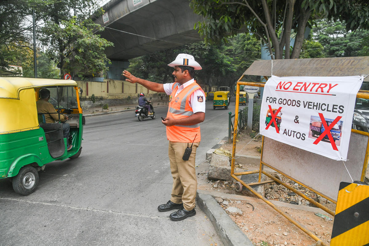 Traffic police have strictly enforced a ban on goods vehicles during peak hours. Credit: DH Photo