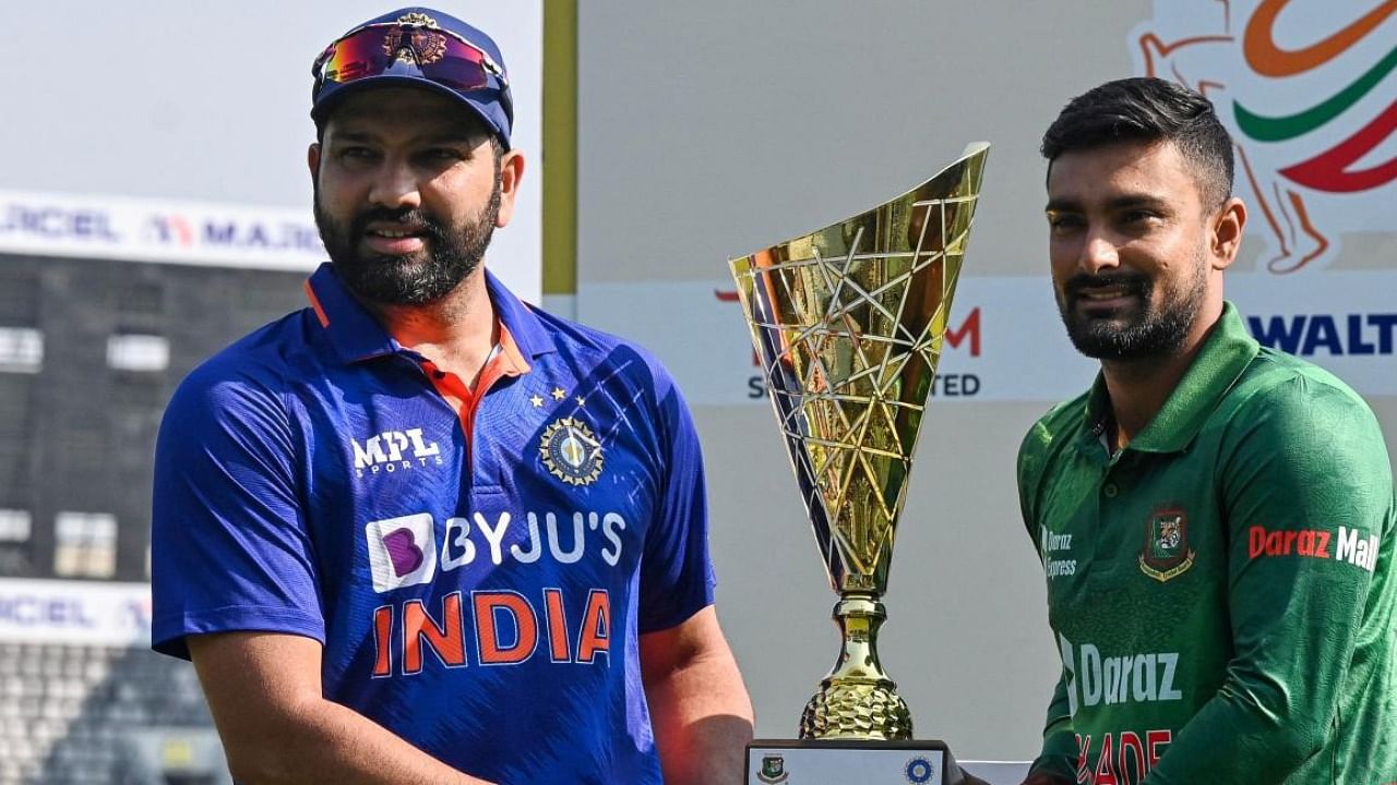  Indian skipper Rohit Sharma (L) and his Bangladeshi counterpart Liton Das (R) at the trophy unveiling program in Dhaka. Credit: AFP