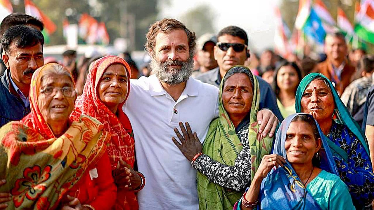 Congress leader Rahul Gandhi with supporters during the party's 'Bharat Jodo Yatra', in Ujjain district. Credit: PTI Photo