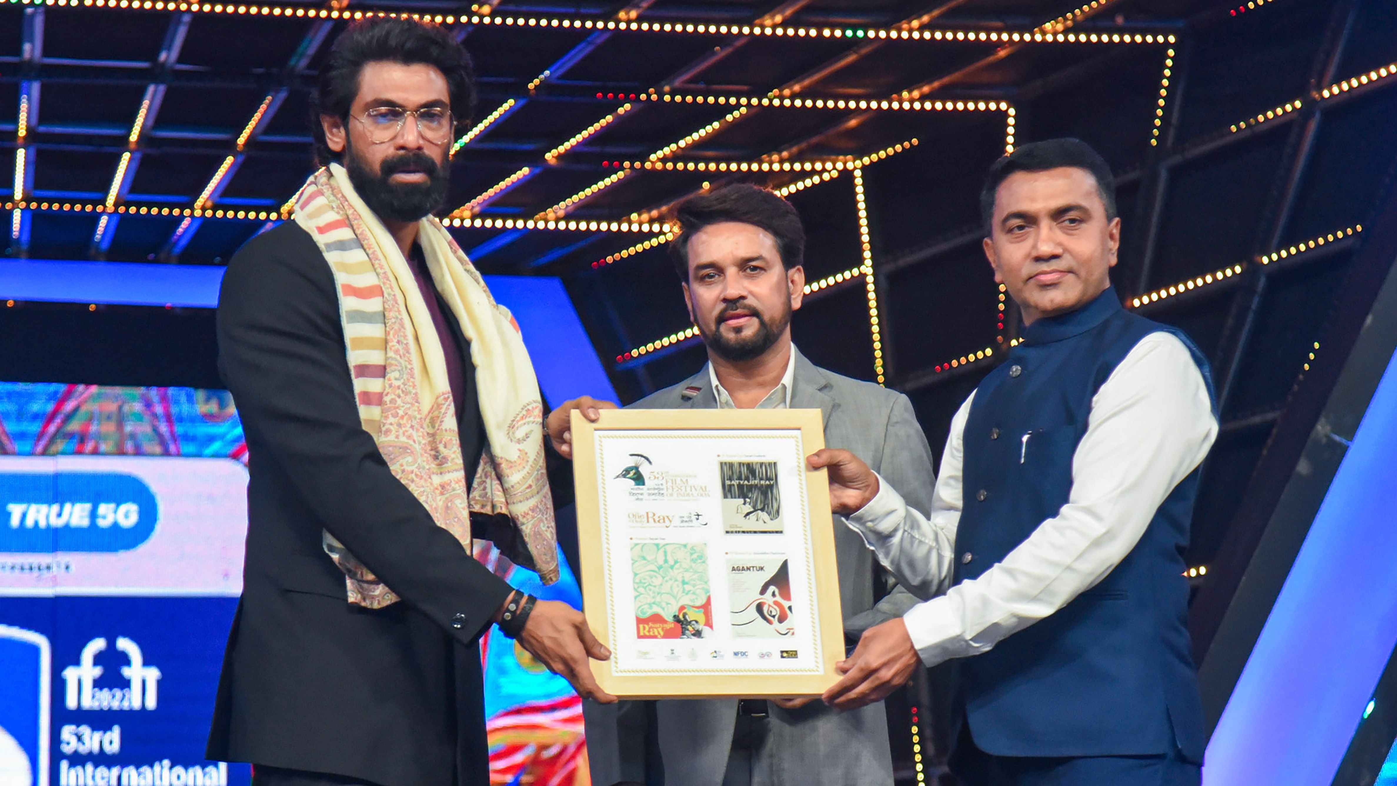 Rana Daggubati being honoured by Anurag Singh Thakur and Pramod Sawant during the closing ceremony of the IFFI. Credit: PTI Photo