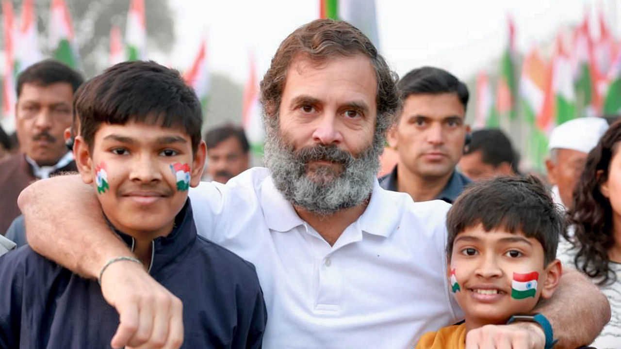 Congress leader Rahul Gandhi with young supporters during the party's 'Bharat Jodo Yatra', in Ujjain district. Credit: PTI Photo