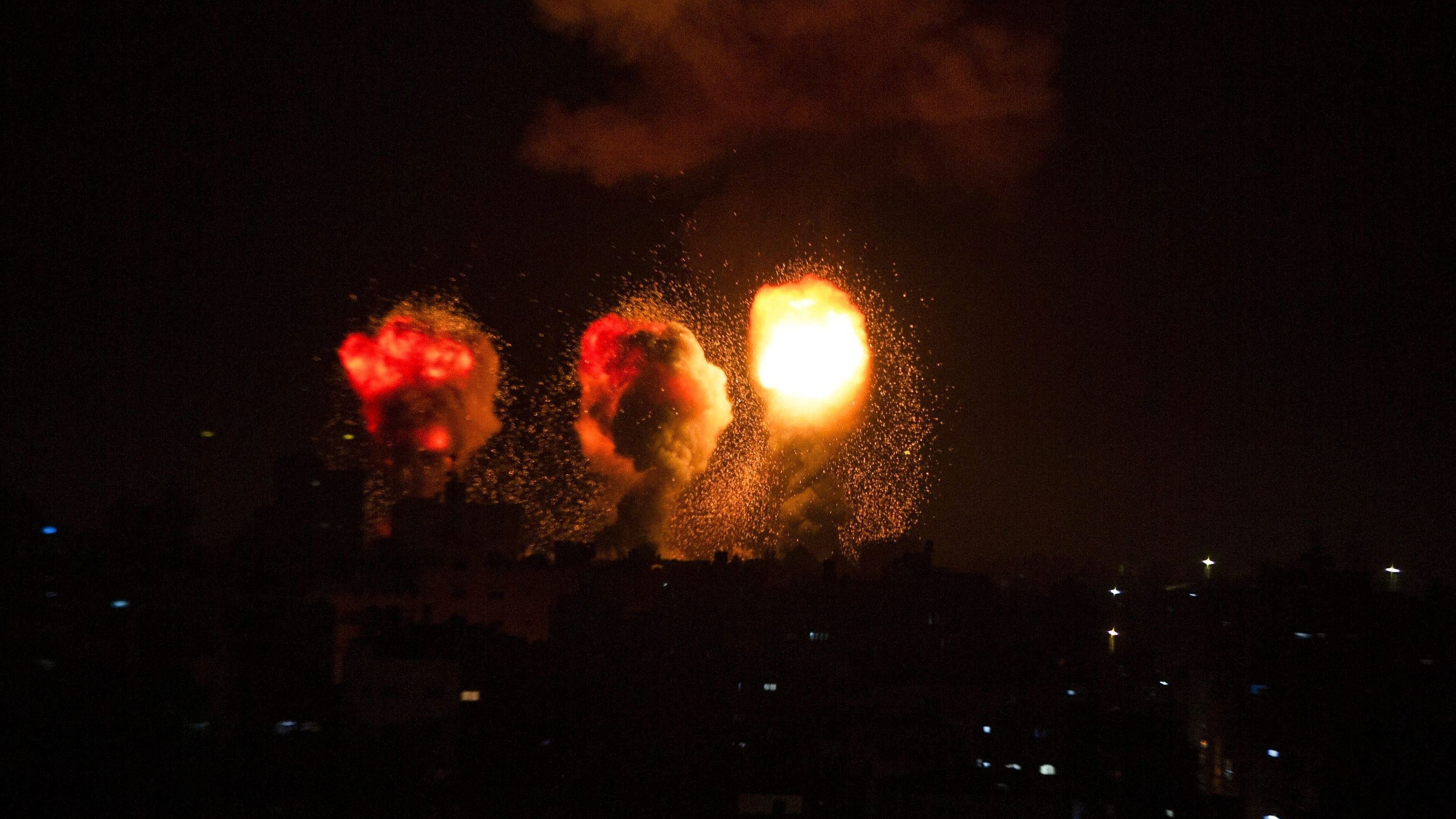 Smoke and flames rise during an Israeli air strike in the Gaza Strip. Credit: AFP Photo
