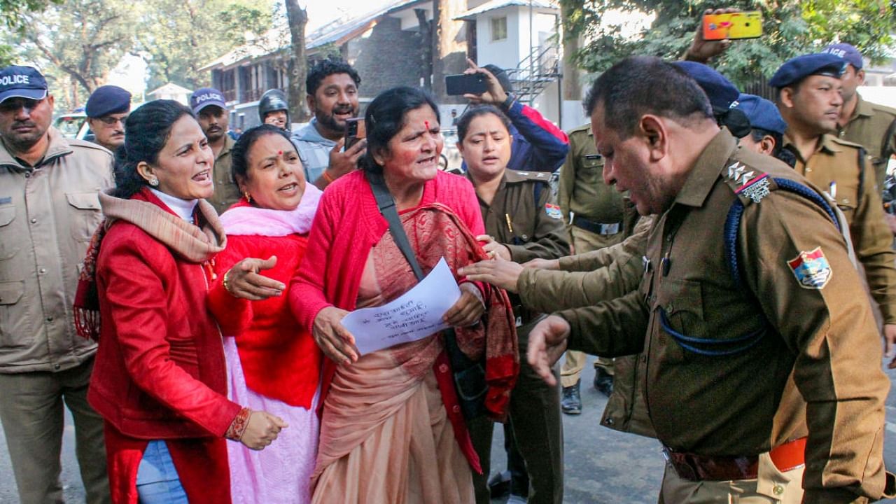 Members of women's group protest in front of police, demanding CBI probe into Ankita Bhandari resort case, in Dehradun. Credit: PTI Photo